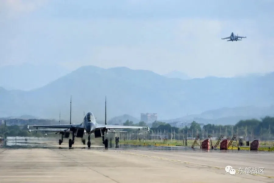 An Air Force aircraft under the Eastern Theater Command of China's People's Liberation Army (PLA) takes off for military exercises in the waters around Taiwan, from an undisclosed location in this 4 August 2022 handout released on 5 August 2022. (Eastern Theater Command/Handout via Reuters)