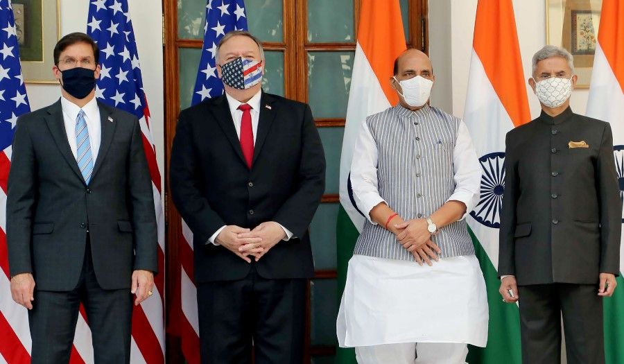 In this handout photograph taken on 27 October 2020 and released by the Indian Press Information Bureau (PIB), India's Union Minister for Defense, Shri Rajnath Singh (second from right), India's Union Minister for External Affairs, Subrahmanyam Jaishankar (R) with the US Secretary of Defense Mark Esper (left) and the US Secretary of State Mike Pompeo (second from left) pose for pictures before their meeting at Hyderabad House in New Delhi. (AFP)