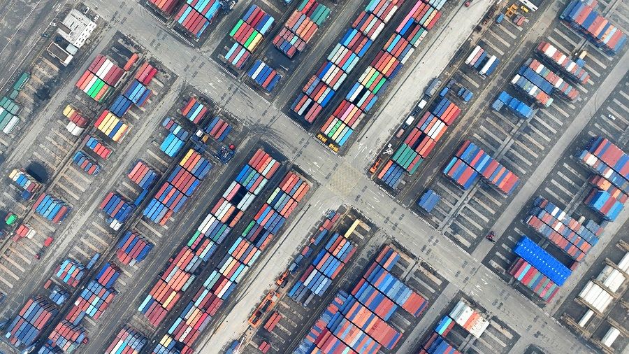This photo taken on 13 January 2023 shows an aerial view of shipping containers stacked at Lianyungang port, Jiangsu province, China. (AFP)