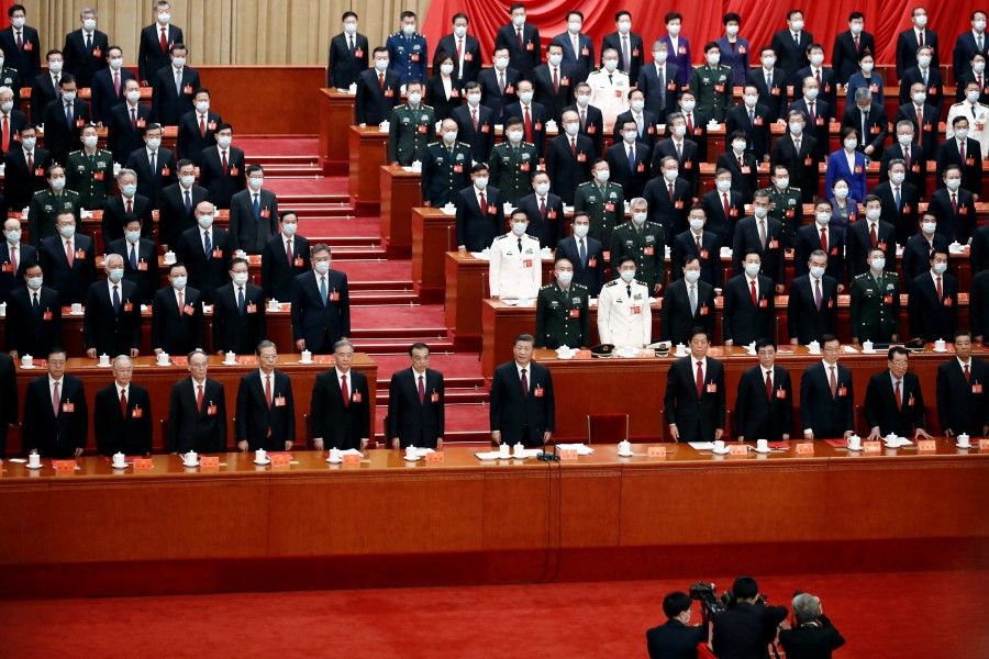 Chinese President Xi Jinping and other officials attend the closing ceremony of the 20th National Congress of the Communist Party of China, at the Great Hall of the People in Beijing, China, 22 October 2022. (Tingshu Wang/Reuters)