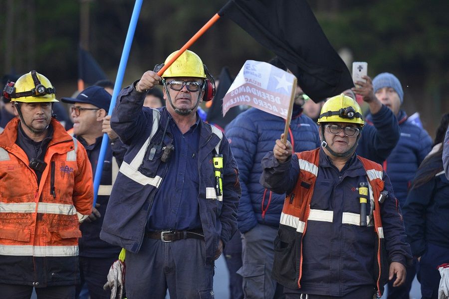 Steel workers protest against the eventual closure of the Huachipato steel plant located in the city of Talcahuano, Chile, on 4 April 2024. Huachipato, in Talcahuano, 500 km south of Santiago, announced the gradual suspension of operations, overwhelmed by the avalanche of Chinese steel that fills the markets and is sold in Chile 40% cheaper than local steel.  (Guillermo Salgado/AFP)