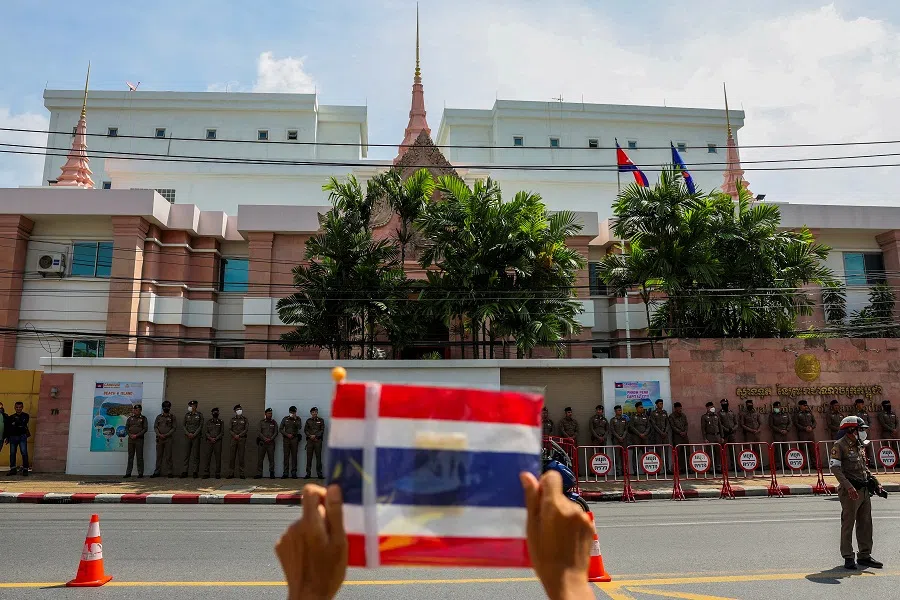 A royalist activist holds a Thai flag as he protests in front of the Royal Embassy of Cambodia, following a recent clash at the Thailand-Cambodia border on 28 May 2025, in Bangkok, Thailand, on 6 June 2025.