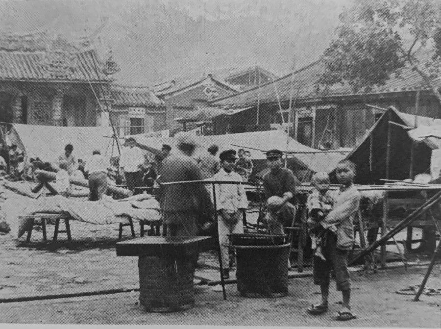 A relief station in front of the temple in Beipu village, Miaoli county, following the 1935 Taichung earthquake.