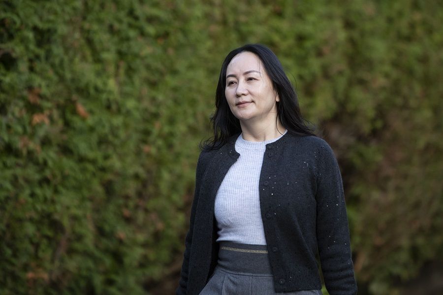 Huawei CFO Meng Wanzhou leaves her home to appear in Supreme Court for a hearing in Vancouver, British Columbia, Canada, 26 October 2020. (Darryl Dyck/Bloomberg)