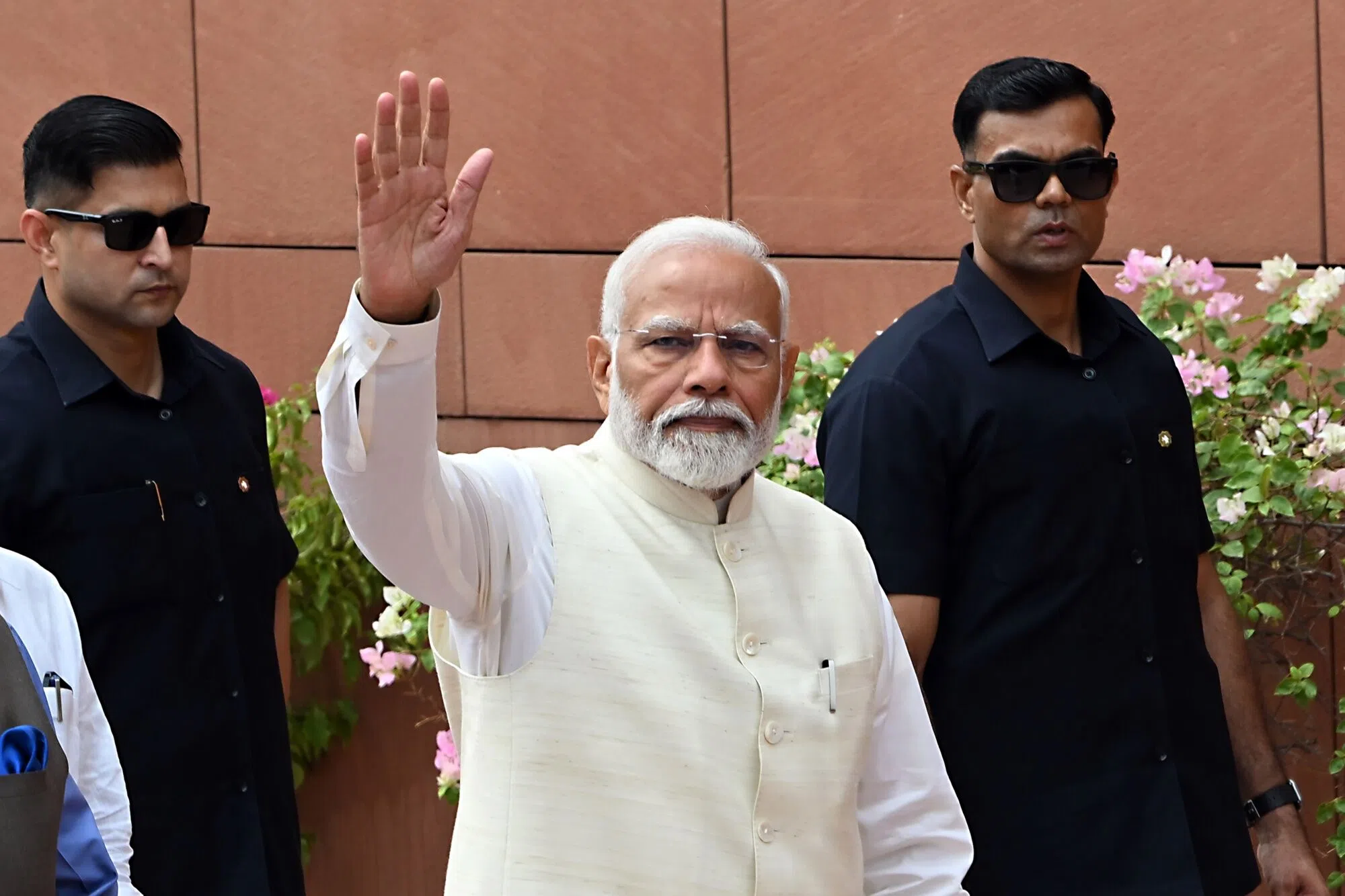 Narendra Modi (centre), India’s prime minister, arrives for a news conference at the Parliament House in New Delhi, India, on 24 June 2024. (Prakash Singh/Bloomberg)