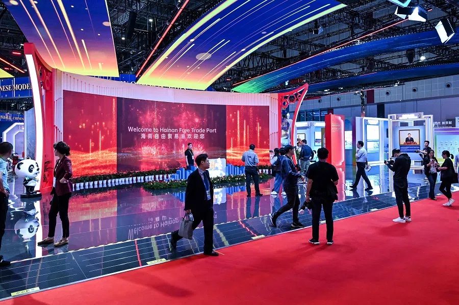 People visit the China stand during the 6th China International Import Expo (CIIE) in Shanghai on 5 November 2023. (Hector Retamal/AFP)