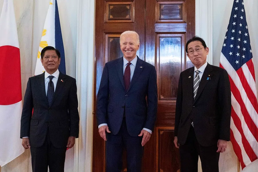 US President Joe Biden speaks to the press with Japanese Prime Minister Fumio Kishida (right) and Philippine President Ferdinand Marcos Jr (left) before a trilateral meeting at the White House in Washington, DC, US, on 11 April 2024.