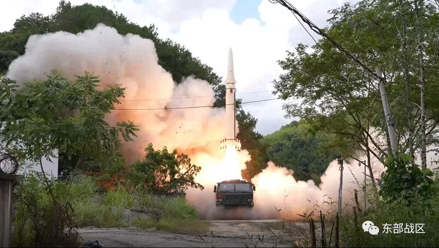 The Rocket Force under the Eastern Theater Command of China's People's Liberation Army (PLA) conducts conventional missile tests into the waters off the eastern coast of Taiwan, from an undisclosed location in this handout released on 4 August 2022. (Eastern Theater Command/Handout via Reuters)
