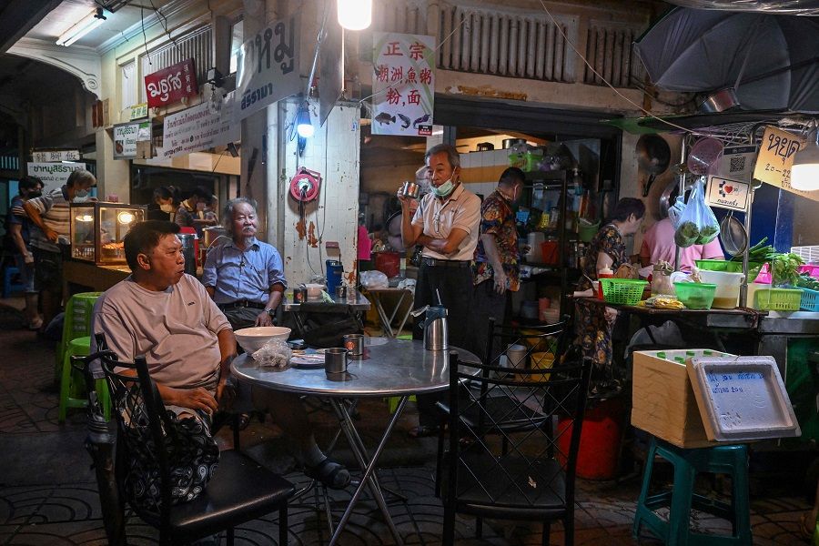 This photo taken on 19 September 2022 shows patrons gathering at a restaurant in Chinatown in Bangkok, Thailand. (Lillian Suwanrumpha/AFP)