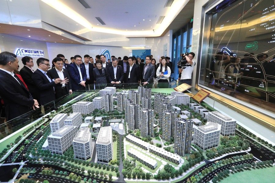 DPM Heng Swee Keat toured the Sino-Singapore Guangzhou Knowledge City, a township being jointly developed by Singapore and China just north of Guangzhou. Here, he is being given a briefing of the Ascendas OneHub Business Park in the township, 27 May 2019. (MCI Singapore)