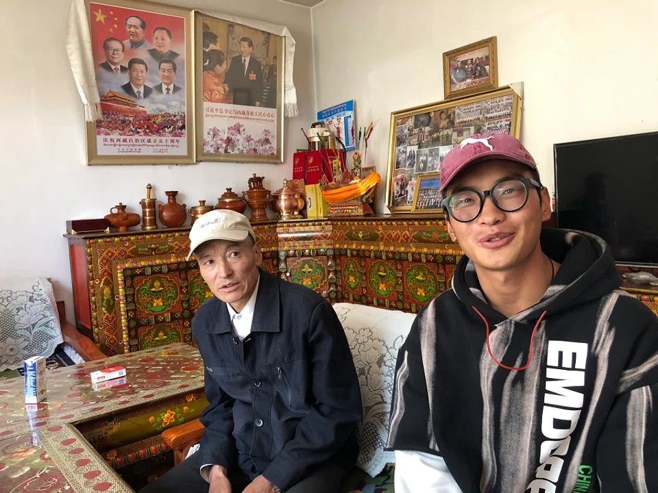 Young Tibetan Danzeng Duoji (right) has no plans to go back to the farm.