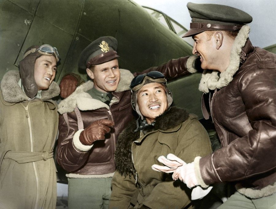Chinese and American pilots talk after completing a mission in an air battle against the Japanese, March 1943. Through their joint resistance against Japan, the two sides developed a deep friendship.