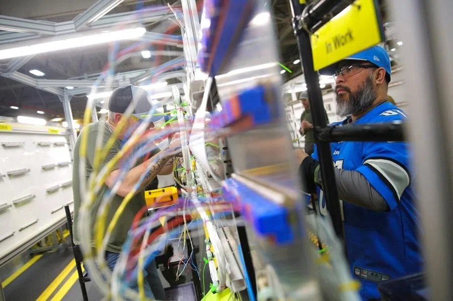 Students in training practice electrical wire routing at the Boeing Foundational Training Center in Renton, Washington, US, on 15 April 2026.