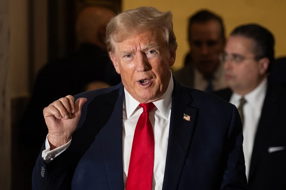 Former US President Donald Trump speaks to members of the media at New York State Supreme Court in New York, US, on 7 December 2023. (Yuki Iwamura/Bloomberg)