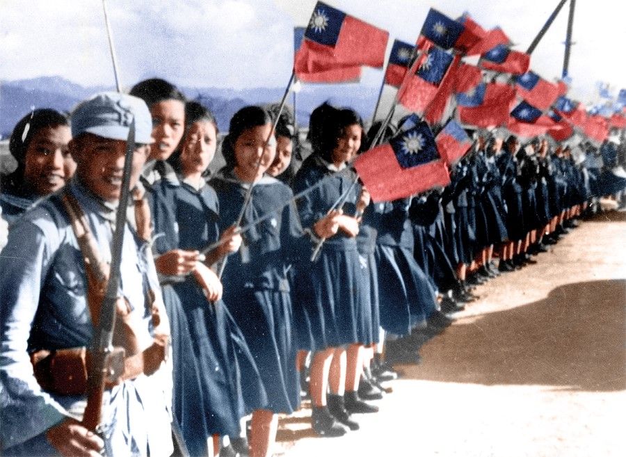 With Japan's surrender in October 1945, the Kuomintang troops arrived in Taiwan and were warmly welcomed by female students in Taipei.