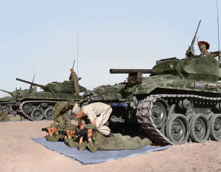 R.O.C Military Academy students learning to use communications equipment under a US army instructor, 1954. This was the means of communication between the soldiers outside the tank and those within. Once the tank hatch is closed, it is difficult for those inside to get information from outside, and the equipment allows communication.