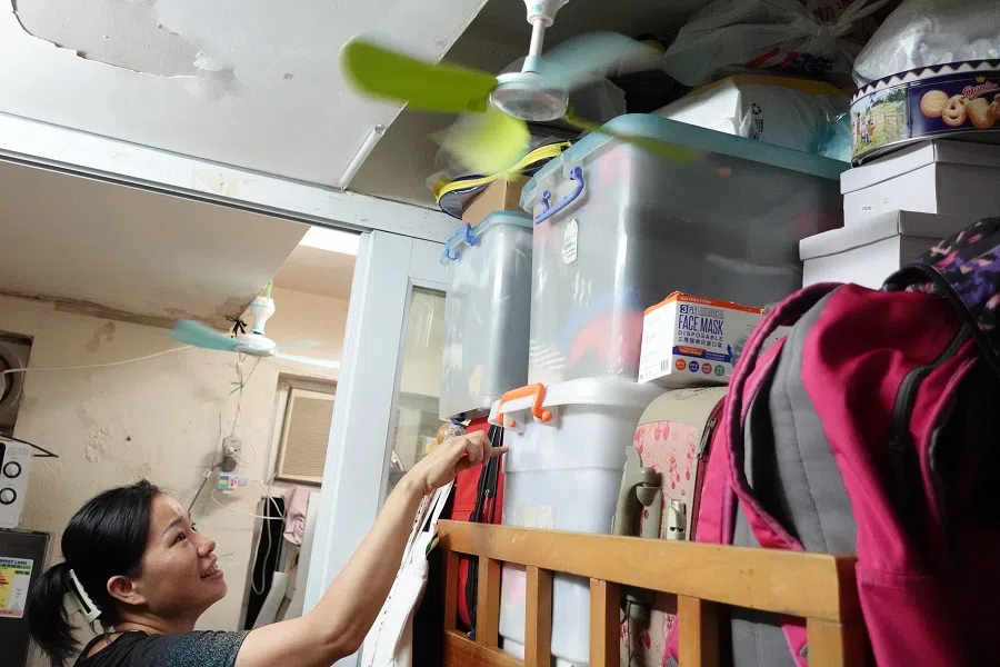 Things are stacked all over Ng's subdivided flat. (Photo: Tai Hing Shing)