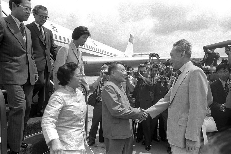 China's then Senior Vice-Premier Deng Xiaoping (centre) arrived in Singapore to a warm welcome from Prime Minister Lee Kuan Yew. Mr Deng, at the age of 74, made his first and only official visit to Singapore in November 1978. (Ministry of Information and the Arts)