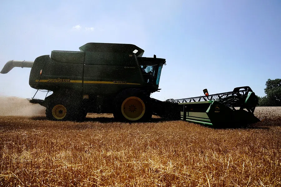Wheat is harvested near Skedee, Oklahoma, US, on 13 June 2024. (Nick Oxford/Reuters)