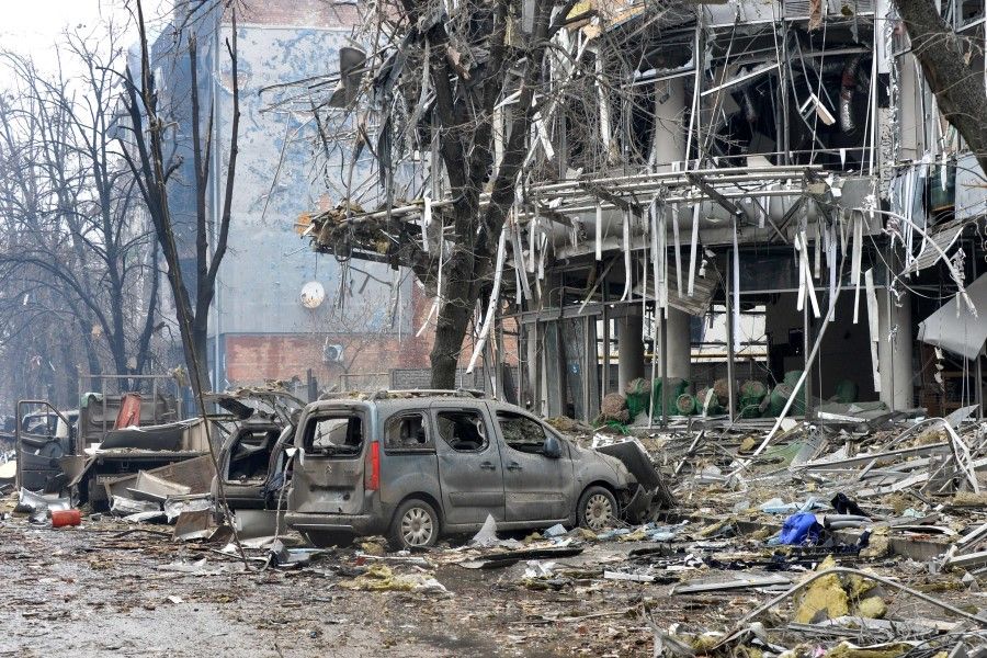 A view of a damaged building after the shelling is said by Russian forces in Ukraine's second biggest city of Kharkiv on 3 March 2022. (Sergey Bobok/AFP)