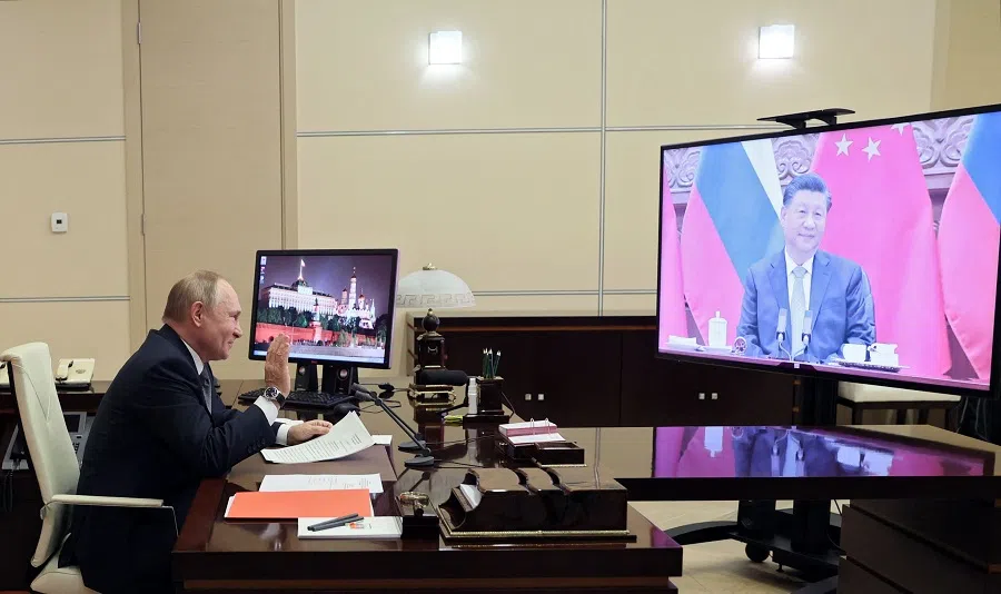Russian President Vladimir Putin holds a meeting with Chinese President Xi Jinping via a video link at the Novo-Ogaryovo state residence outside Moscow, Russia, on 15 December 2021. (Mikhail Metzel/Sputnik/AFP)