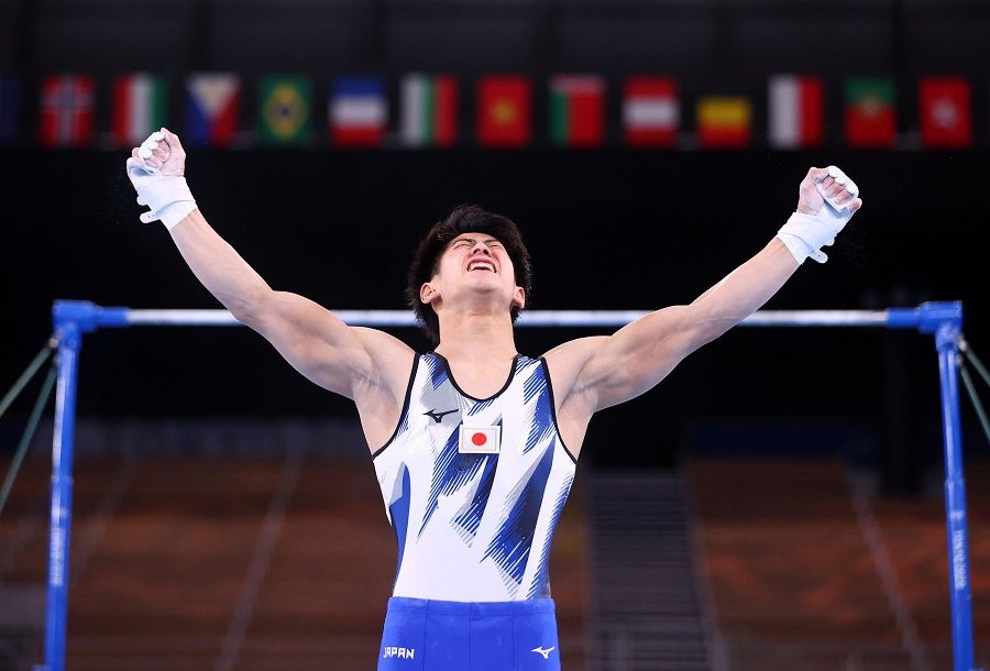 Daiki Hashimoto of Japan reacts after performing on the horizontal bar, Ariake Gymnastics Centre, Tokyo, Japan, 28 July 2021. (Lindsey Wasson/Reuters)
