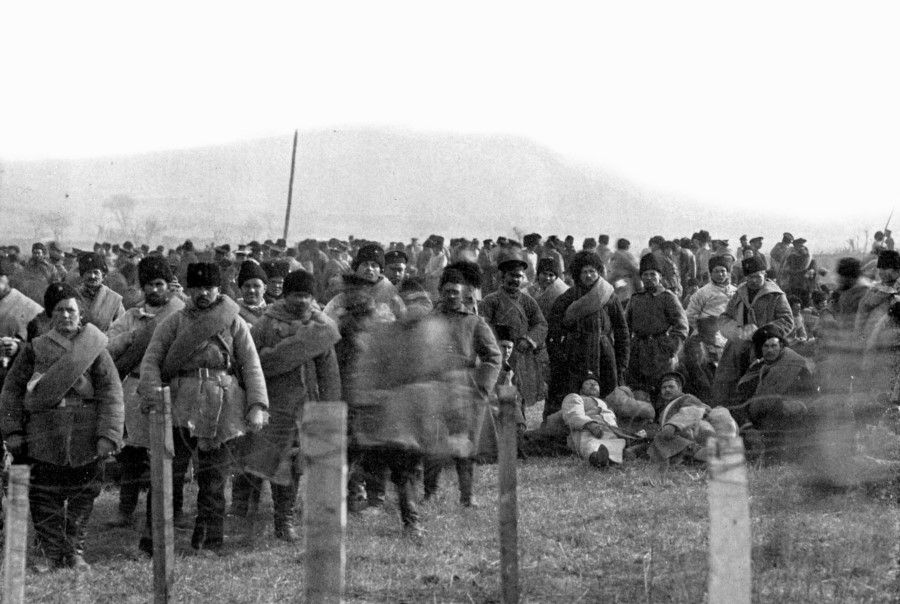 A group of Russian troops surrender to the Japanese, 1905. In early March, the Japanese launched a general offensive on Mukden. The Third Army took Xinmin, while the Russians retreated from Huairen. Soon after, the Japanese took Fushun and cut off the Russians' northward route, and attacked Mukden. The Russians were heavily defeated and retreated to their base at Ssupingkai (now Siping), 175 kilometres north of Mukden. In this encounter at Mukden, the Russians suffered 90,000 casualties while the Japanese had 70,000 casualties. Both sides fought until they were too exhausted to continue.