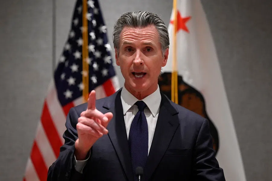 Governor of California Gavin Newsom speaks during a press conference in Beijing, China, on 25 October 2023. (Wang Zhao/AFP)