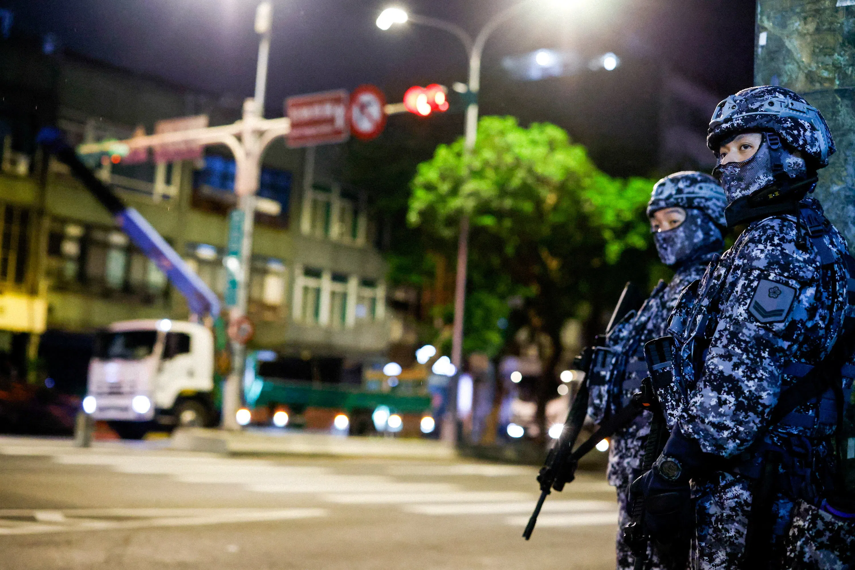Taiwanese Military Police personnel stand guard during a drill as part of the annual Han Kuang military exercises in Taipei, Taiwan, on 12 August 2026.