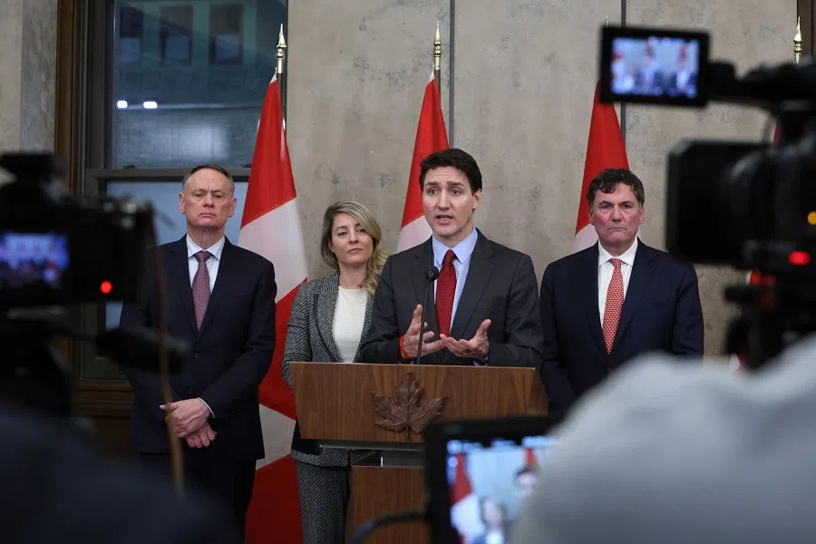 Justin Trudeau, Canada’s prime minister (centre) speaks during a press conference on Parliament Hill in Ottawa, Ontario, Canada, on 1 February 2025. (David Kawai/Bloomberg)