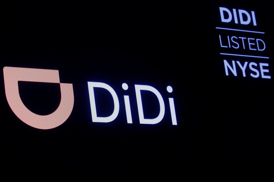 A screen displays trading information for ride-hailing giant Didi Global on the floor of the New York Stock Exchange (NYSE) in New York City, US, 3 December 2021. (Brendan McDermid/File Photo/Reuters)