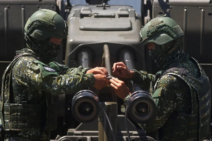 Soldiers demonstrate a GDF-006 anti-aircraft gun to the media in Hualien, Taiwan, 18 August 2022. (Ann Wang/Reuters)