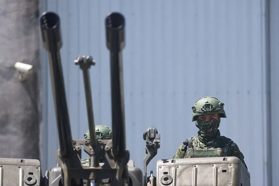 Soldiers demonstrate a GDF-006 anti-aircraft gun to the media in Hualien, Taiwan, 18 August 2022. (Ann Wang/Reuters)