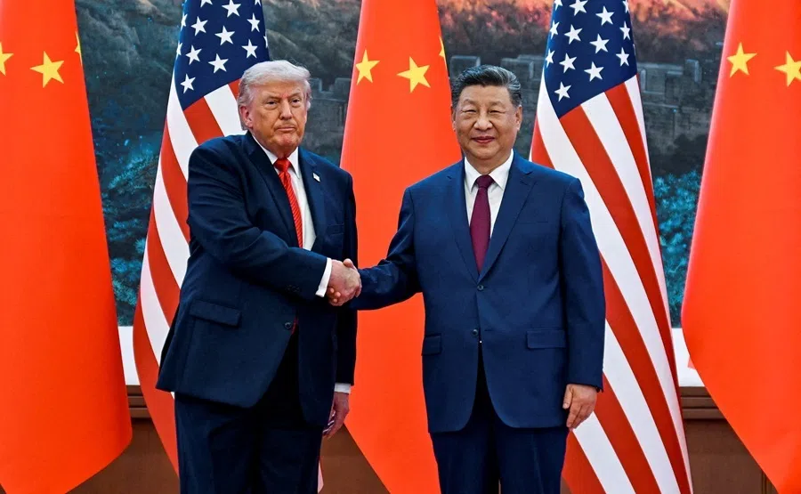 US President Donald Trump greets Chinese President Xi Jinping at the Great Hall of the People in Beijing, China, on 14 May 2026.