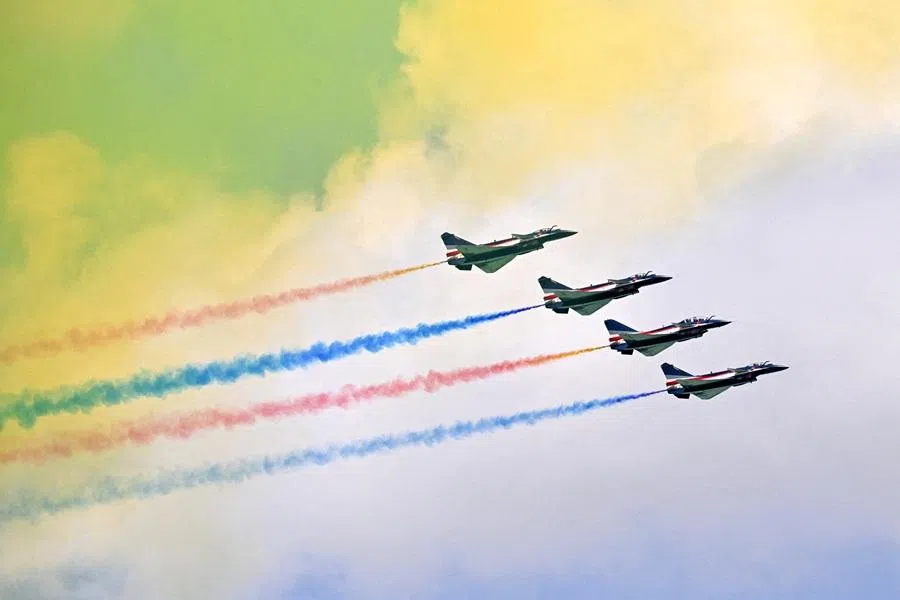 The People's Liberation Army Air Force Bayi Aerobatic Team perform during an aerial flying display at the Singapore Airshow at Changi Exhibition Centre, in Singapore on 3 February 2026. (Caroline Chia/Reuters)