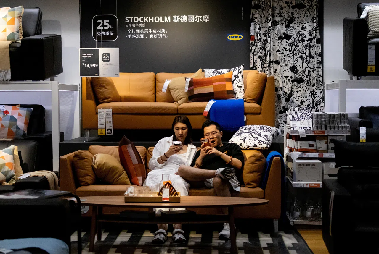 A couple rests on a sofa at an IKEA store in Beijing, China, on 5 July 2026.