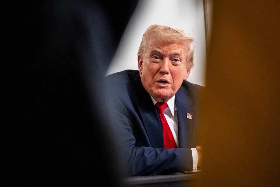 President Donald Trump participates in a call with US service members from his Mar-a-Lago club in Florida on Thanksgiving Day on 27 November 2025 in Palm Beach, Florida.
