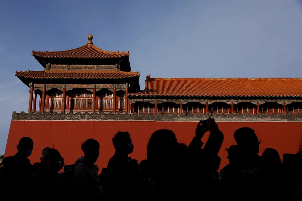 People queue to enter the Forbidden City in Beijing, China, on 19 October 2023. (Edgar Su/Reuters)