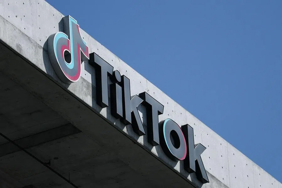 The TikTok logo is displayed on signage outside TikTok social media app company offices in Culver City, California, on 30 September 2025. (Patrick T. Fallon/AFP)