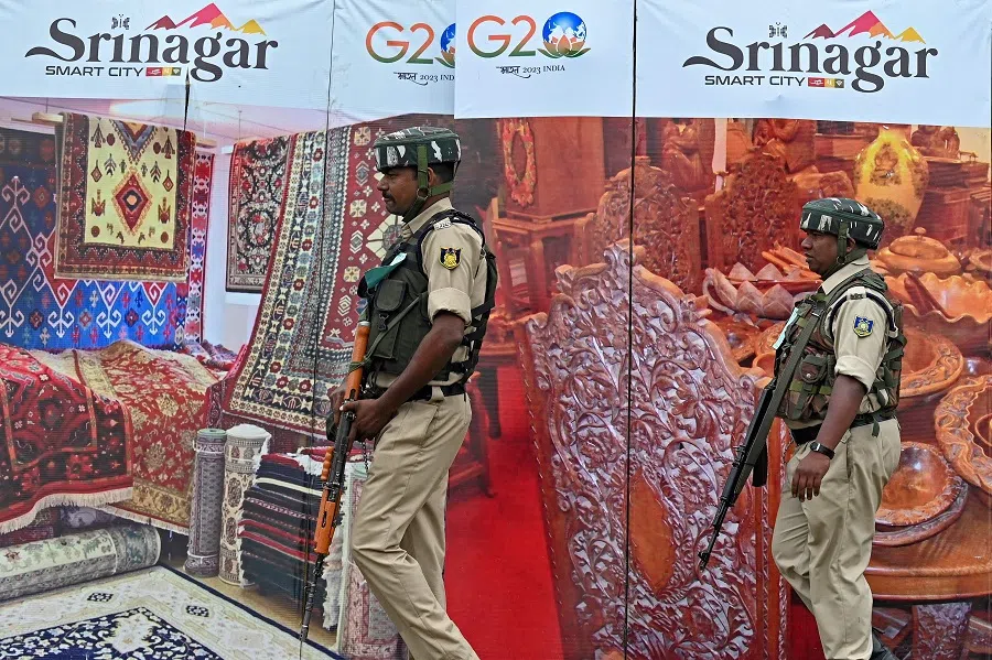 Indian paramilitary troopers patrol at Polo View market before the visit of G20 delegates in Srinagar on 24 May 2023. (Tauseef Mustafa/AFP)