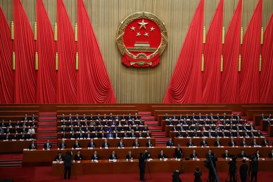 Chinese President Xi Jinping, Chinese Premier Li Qiang and other government officials attend the closing session of the National People's Congress (NPC) at the Great Hall of the People in Beijing, China, 12 March 2026.