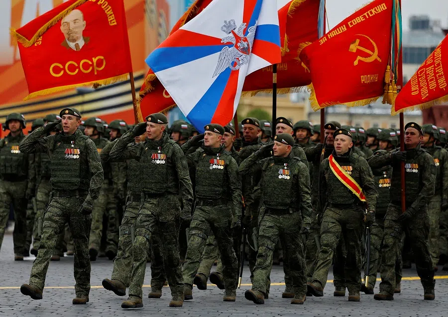 Russian service members, who were involved in the country’s military campaign in Ukraine, march in columns during a military parade on Victory Day in Red Square in Moscow, Russia on 9 May 2024.