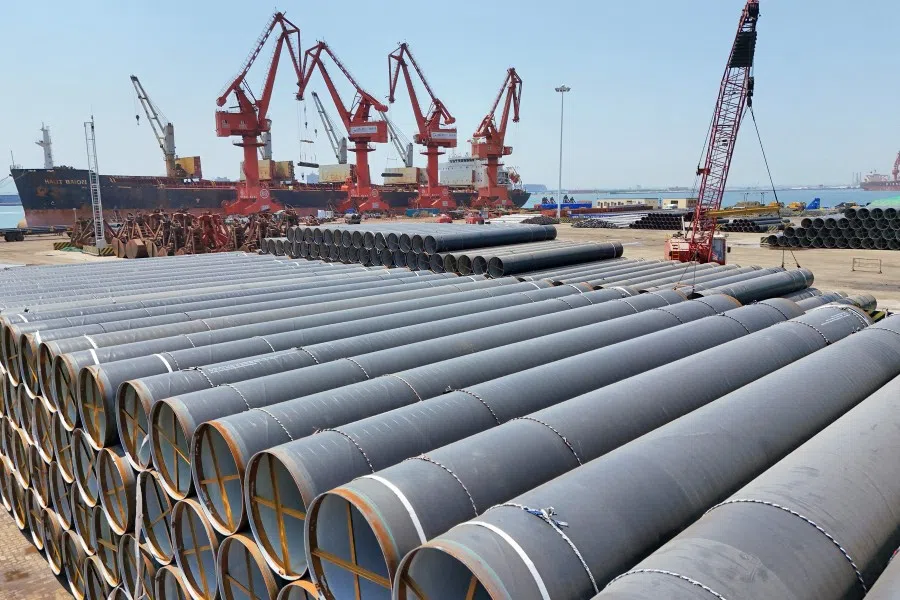 Steel pipes for export are seen at Longkou port in Yantai, China’s eastern Shandong province on 18 June 2025. (AFP)