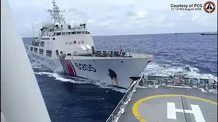 This frame grab from handout video footage taken and released on 31 August 2024 by the Philippine Coast Guard (PCG) shows a China Coast Guard ship (L) colliding with PCG ship BRP Teresa Magbanua near the Sabina Shoal in disputed waters of the South China Sea. (AFP/Philippine Coast Guard)