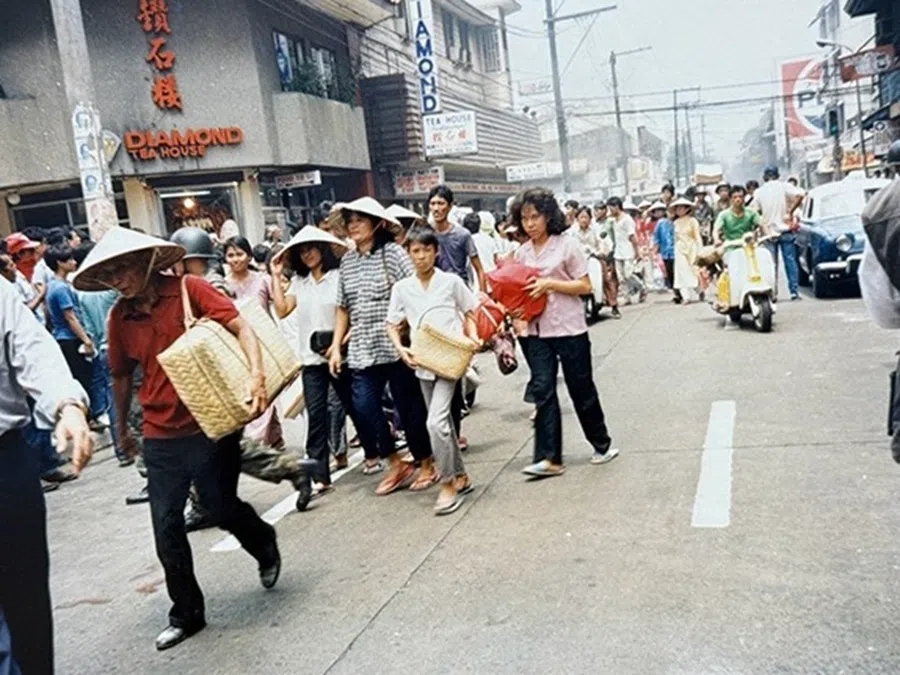 A Hong Kong film crew shooting scenes depicting the fall of Saigon on the streets of Manila.