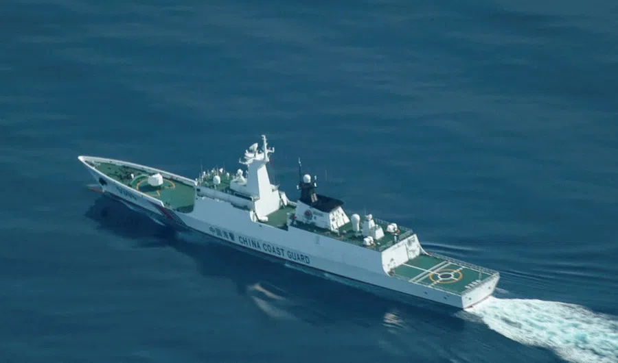 An aerial view of a China Coast Guard ship navigating near the disputed Scarborough Shoal, in the South China Sea, on 13 August 2025. (Adrian Portugal/Reuters)