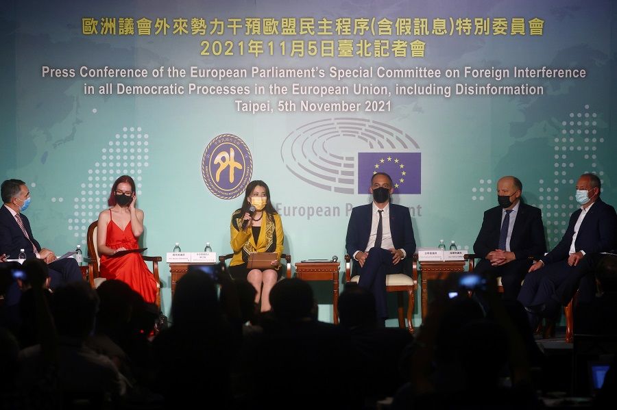 Raphael Glucksmann, head of the European Parliament's Special Committee on Foreign Interference, (third from right) and other members of the European Parliament delegation attend a news conference in Taipei, Taiwan, 5 November 2021. (Ann Wang/Reuters)