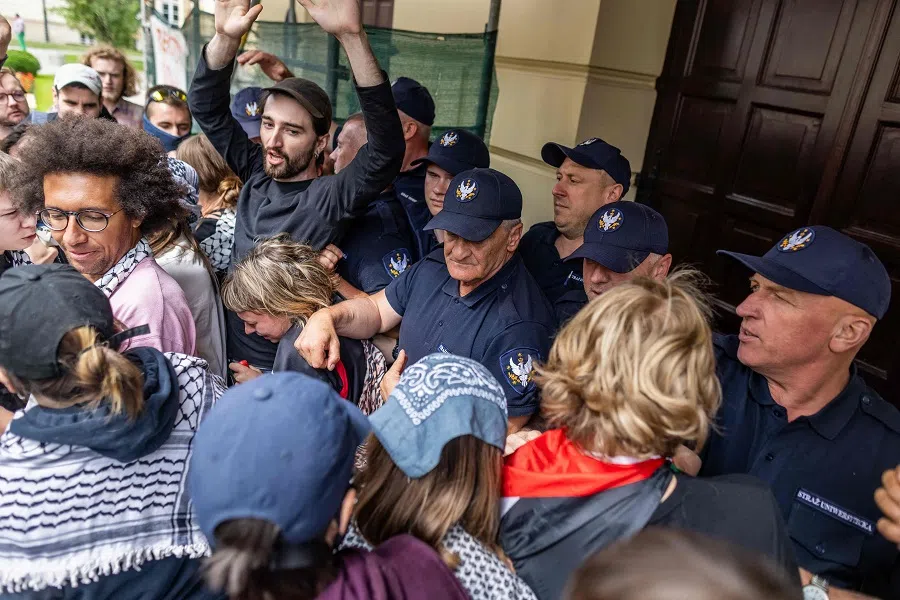 Pro-Palestinian students and supporters protest on 12 June 2024 at the Warsaw University campus. (Wojtek Radwanski/AFP)