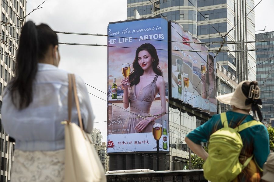 A public screen displays an advertisement for Stella Artois beer in Shanghai, China, on 18 August 2021. (Qilai Shen/Bloomberg)