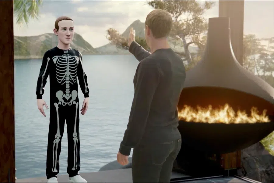 Facebook CEO Mark Zuckerberg speaks to an avatar of himself in the "Metaverse" during a live-streamed virtual and augmented reality conference to announce the rebrand of Facebook as Meta, in this screen grab taken from a video released 28 October 2021. (Facebook/Handout via Reuters)